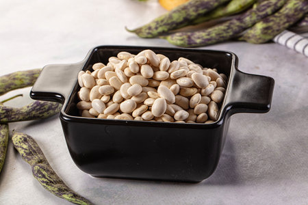 Raw dry white beans kidney heap