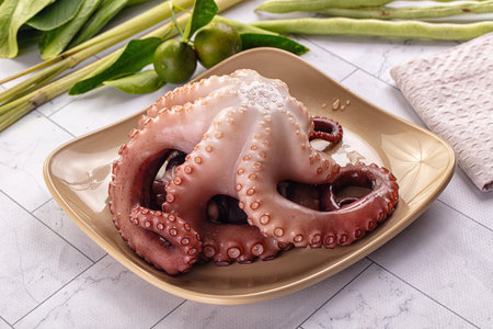 Gourmet boiled fresh octopus in the plateの写真素材