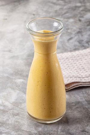 Sweet cold mango smoothie dessert glass