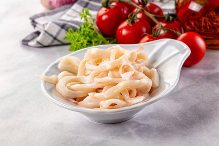 Canned marinated squid rings heap snack appetizer
