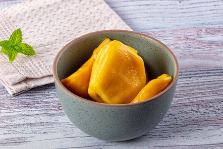 Canned sweet juicy yellow Jackfruit segmentの写真素材