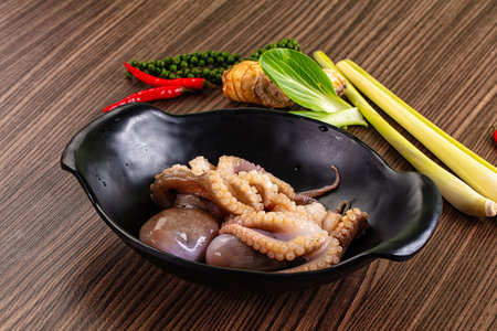 Delicous raw wild octopus for cookingの写真素材