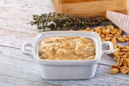 Raw Peanut butter spread with nuts