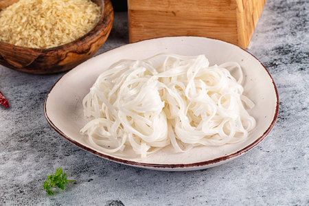 Boiled asian rice pho noodles for soup