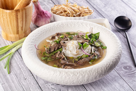 Vietnamese Pho Bo soup with beef and noodles