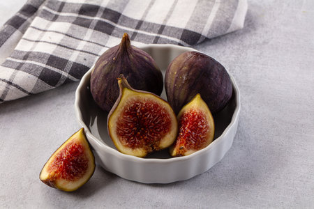 Ripe juicy sweet purple fig fruitの写真素材