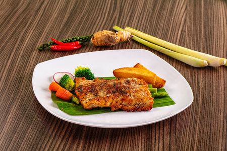 Gourmet asian Grilled crocodile steak served potato and asparagusの写真素材
