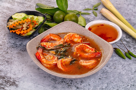 Asian sour spicy soup with prawn and herbsの写真素材