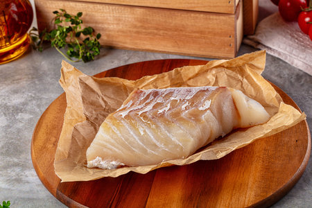Raw cod fish fillet for cookingの写真素材