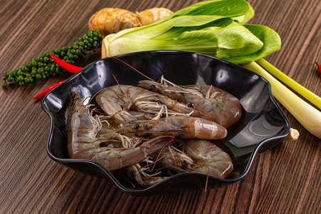 Raw wild prawns heap for cooking in the bowlの写真素材