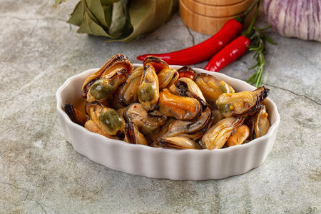 Tasty canned mussels in oil and spices