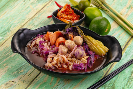 Korean kimchi beef noodles soup with meat and vegetables
