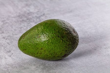 Raw ripe green juicy avocado tropical fruitの写真素材
