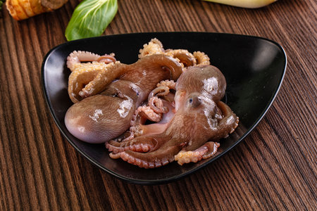 Delicous raw wild octopus for cookingの写真素材