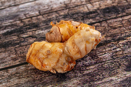 Raw galangal roots heap seasoning aroma