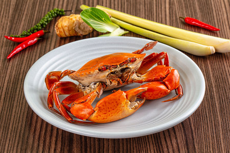 Gourmet Steamed orange wild crab in the plateの写真素材
