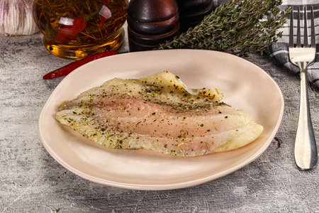 Baked tilapia fish fillet with spices