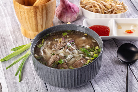 Vietnamese Pho Bo soup with beef and noodles