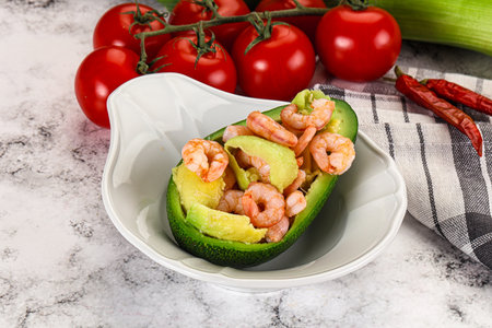 Dietary avocado cut with prawn and lemon juiceの写真素材