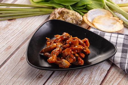 Razor shell clam with spicy sauceの写真素材