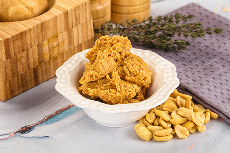 Crunchy peanut butter fat product for breakfast