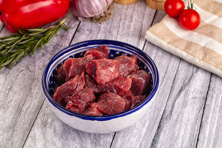 Raw beef meat cubes pieces heapの写真素材