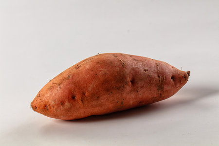 Raw sweet potato batat for cookingの写真素材