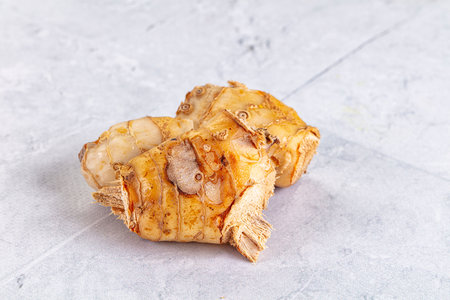 Raw galangal roots heap seasoning aromaの写真素材