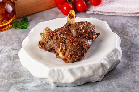 Baked lamb leg steak with spices