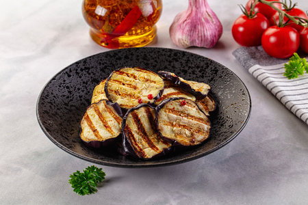 Tasty grilled eggplant round slices snackの写真素材