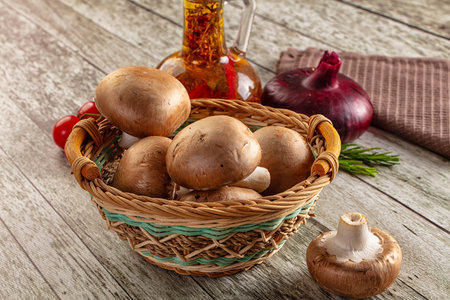 Raw brown champignon heap for cookingの写真素材