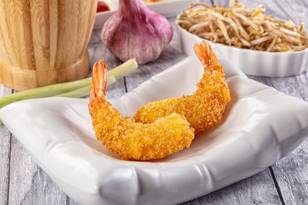 Golden crunhy breaded prawn appetizer snackの写真素材