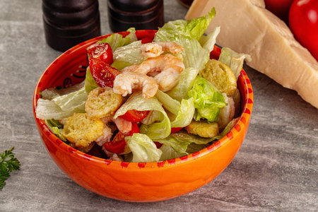 Tasty caesar salad with prawnの写真素材