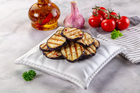 Tasty grilled eggplant round slices snackの写真素材