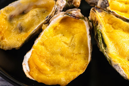 Plate of Baked oyster with parmesan cheeseの写真素材