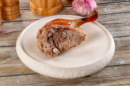 Gourmet roasted tasty duck leg with skinの写真素材