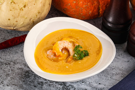 Pumpkin dietary cream soup with prawnsの写真素材