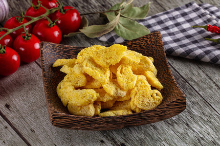 Fried crispy crouton bread slices in the bowlの写真素材