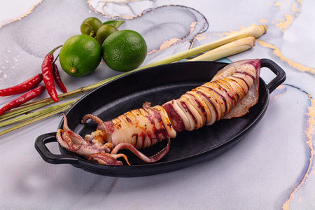 Tasty grilled wild squid with lime - Asian streetfoodの写真素材