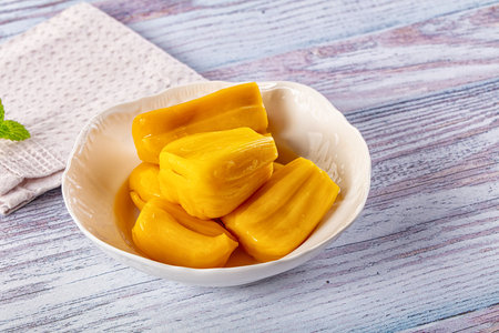 Canned sweet juicy yellow Jackfruit segmentの写真素材