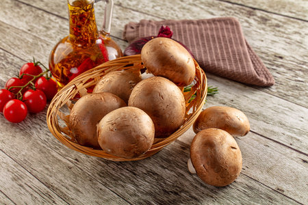 Raw brown champignon heap for cookingの写真素材