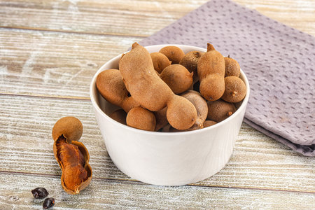 Tropical exotic Tamarind fruit heap beansの写真素材