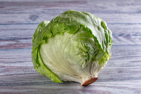 Green ripe Iceberg cabbage for saladの写真素材
