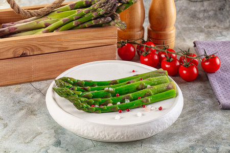 Green spring boiled rustic asparagus sproutsの写真素材