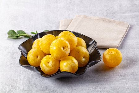 Ripe sweet fresh juicy yellow plumの写真素材