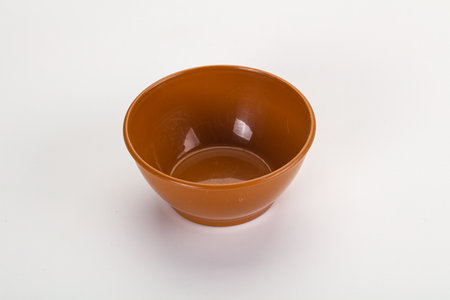 Empty clean color bowl dishware isolatedの写真素材