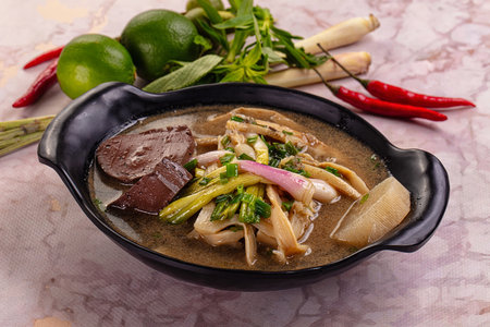 Asian Bamboo shoots traditional soup served green onion