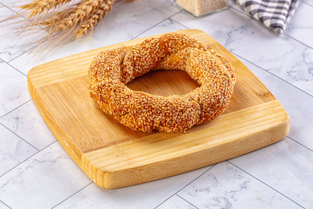 Traditional Turkish Simit circle with sesame seeds for breakfast