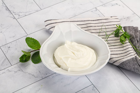 Traditional soft dietary Greek yoghurt served mint leavesの写真素材