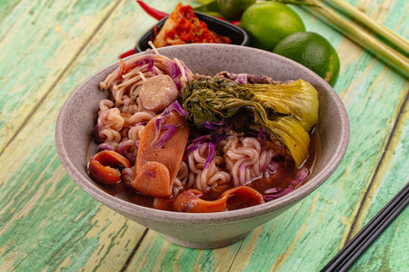 Korean kimchi beef noodles soup with meat and vegetables